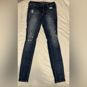 Distressed Blue Jeans